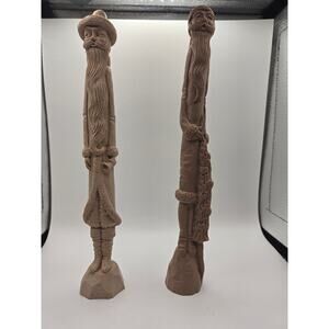 "Pencil Santa" figurines by artist Jim Shore